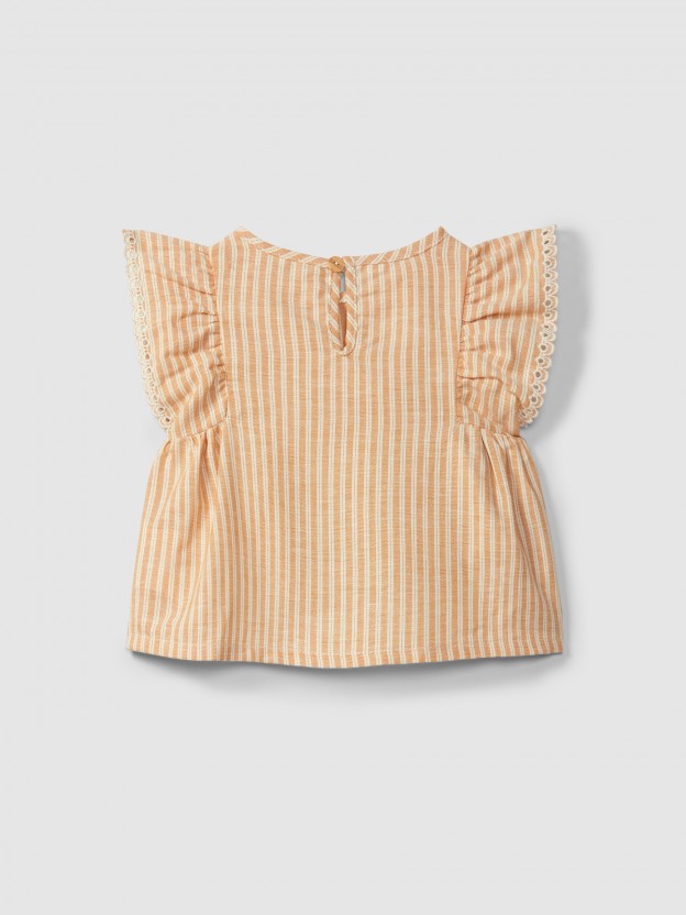 Blouse in striped fabric and English embroidery detail Blouse in striped fabric and English embroidery detail