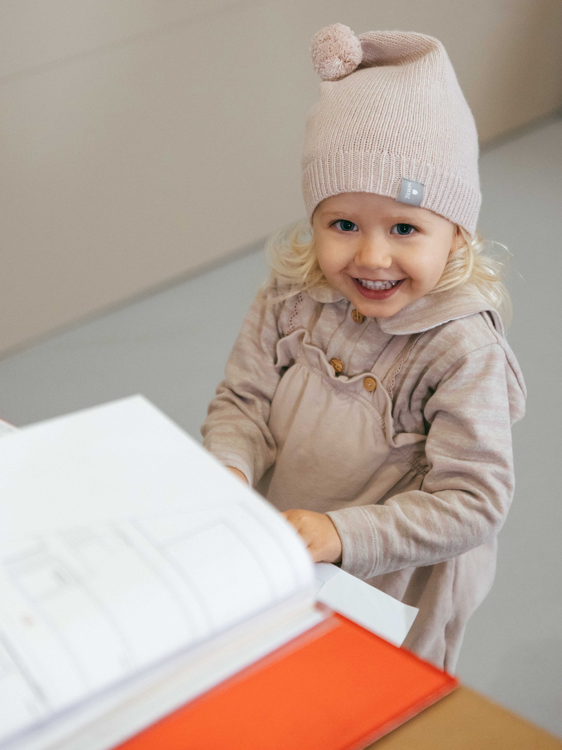 Knitted beanie with pom-pom