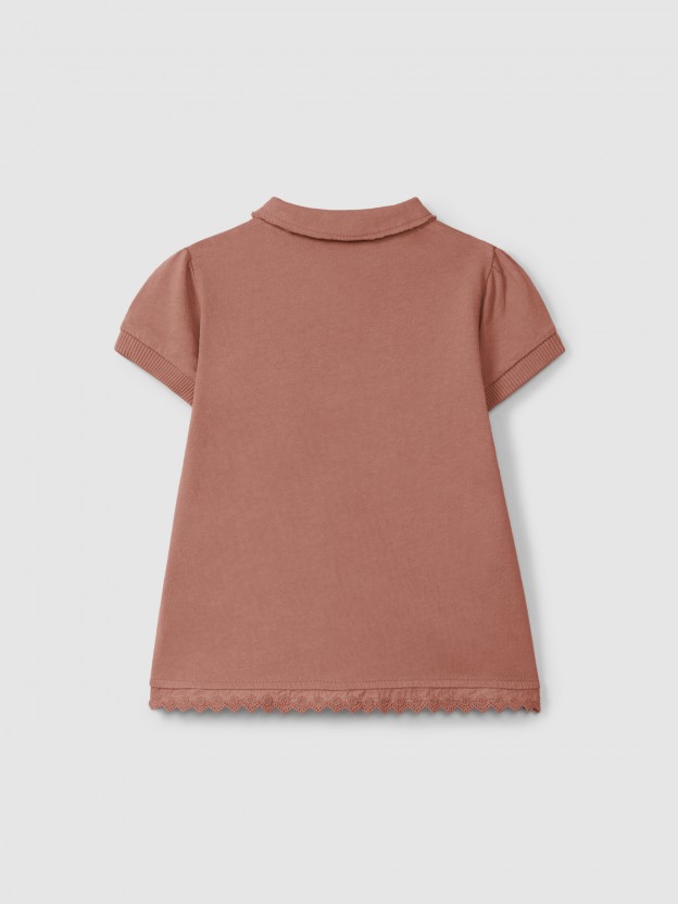 Plain jersey dress with embroidered details