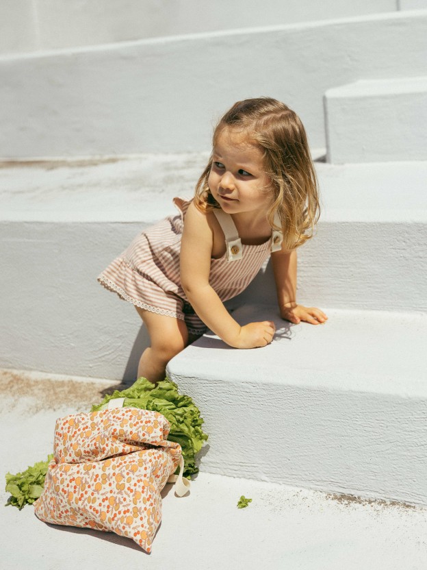 Overalls in striped fabric and English embroidery detail
