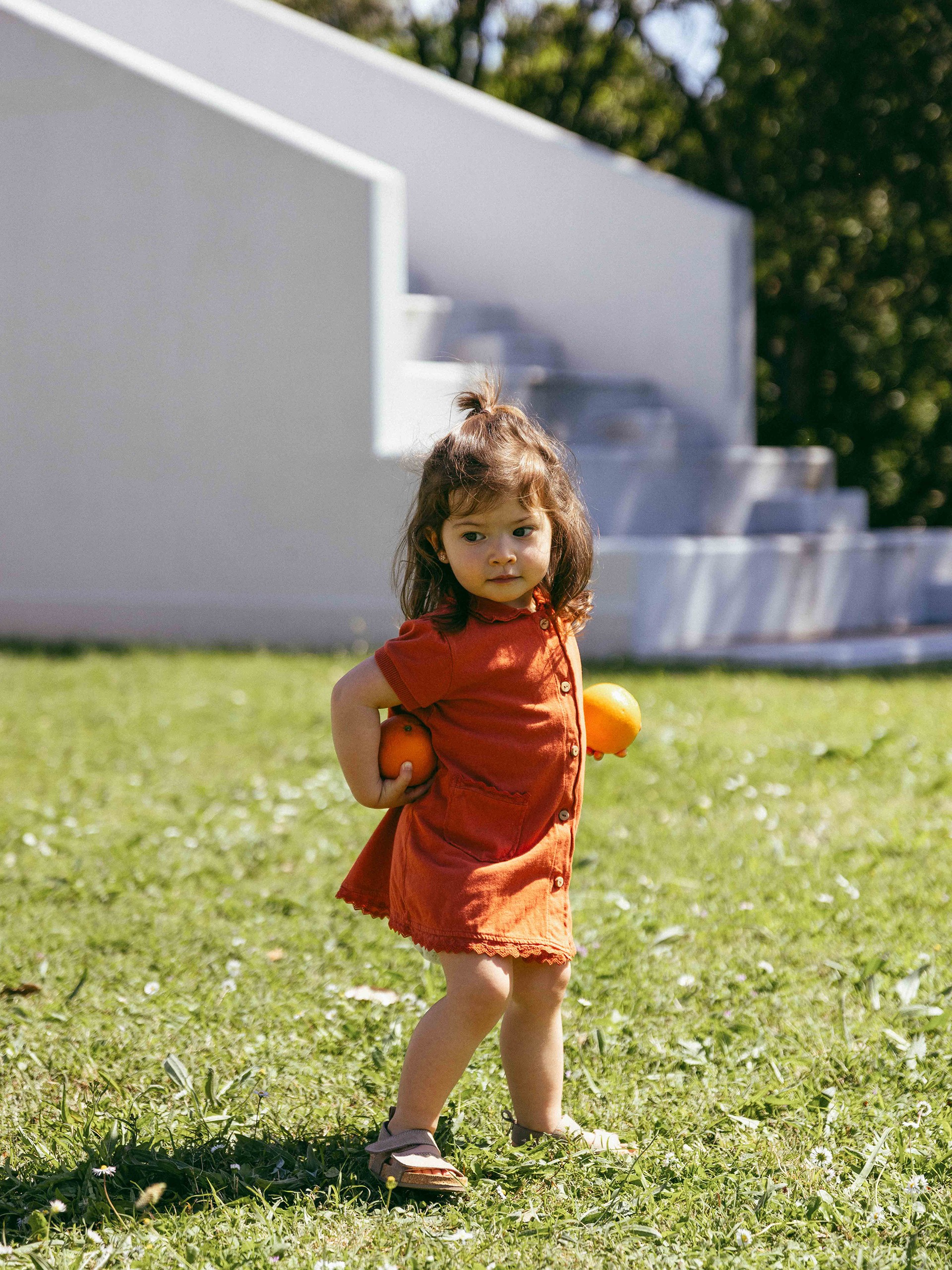 Plain jersey dress with embroidered details