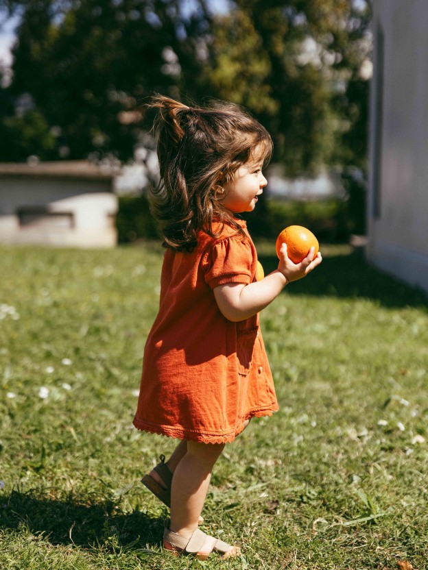 Plain jersey dress with embroidered details