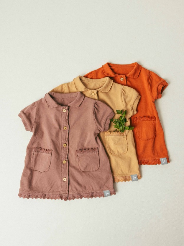 Plain jersey dress with embroidered details Plain jersey dress with embroidered details