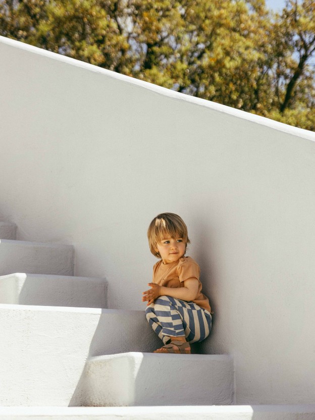 Pull-up pants striped with pocket