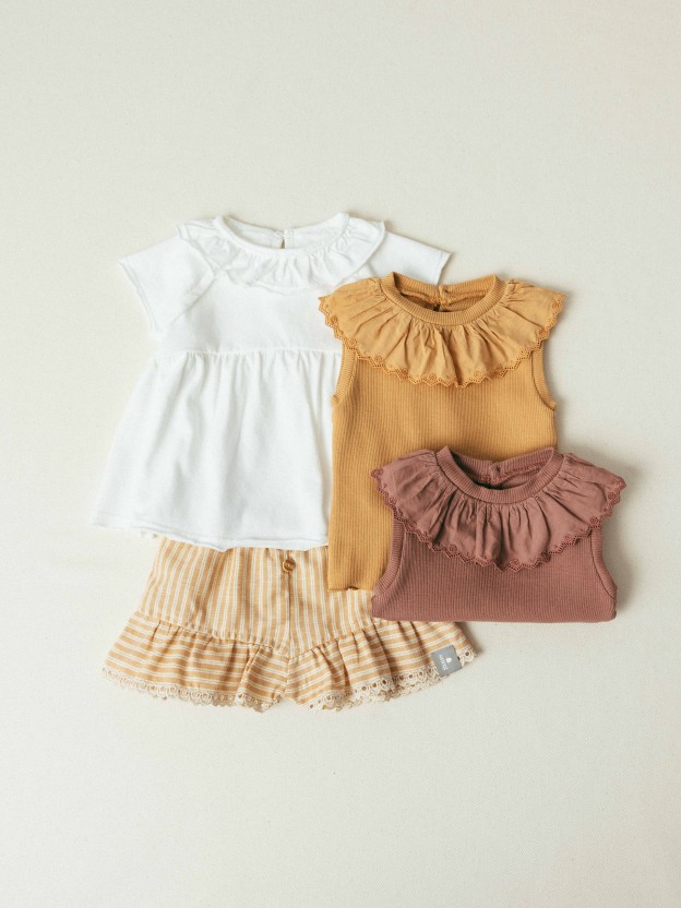 Pull-up shorts in striped fabric and English embroidery detail