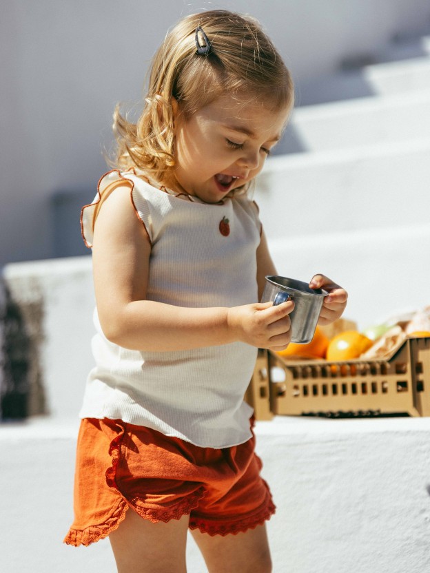 Plain jersey pull-up shorts with embroidered details