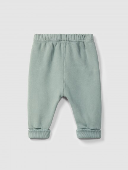 Pantalones pull-up en felpa con detalle en picunela Pantalones pull-up en felpa con detalle en picunela