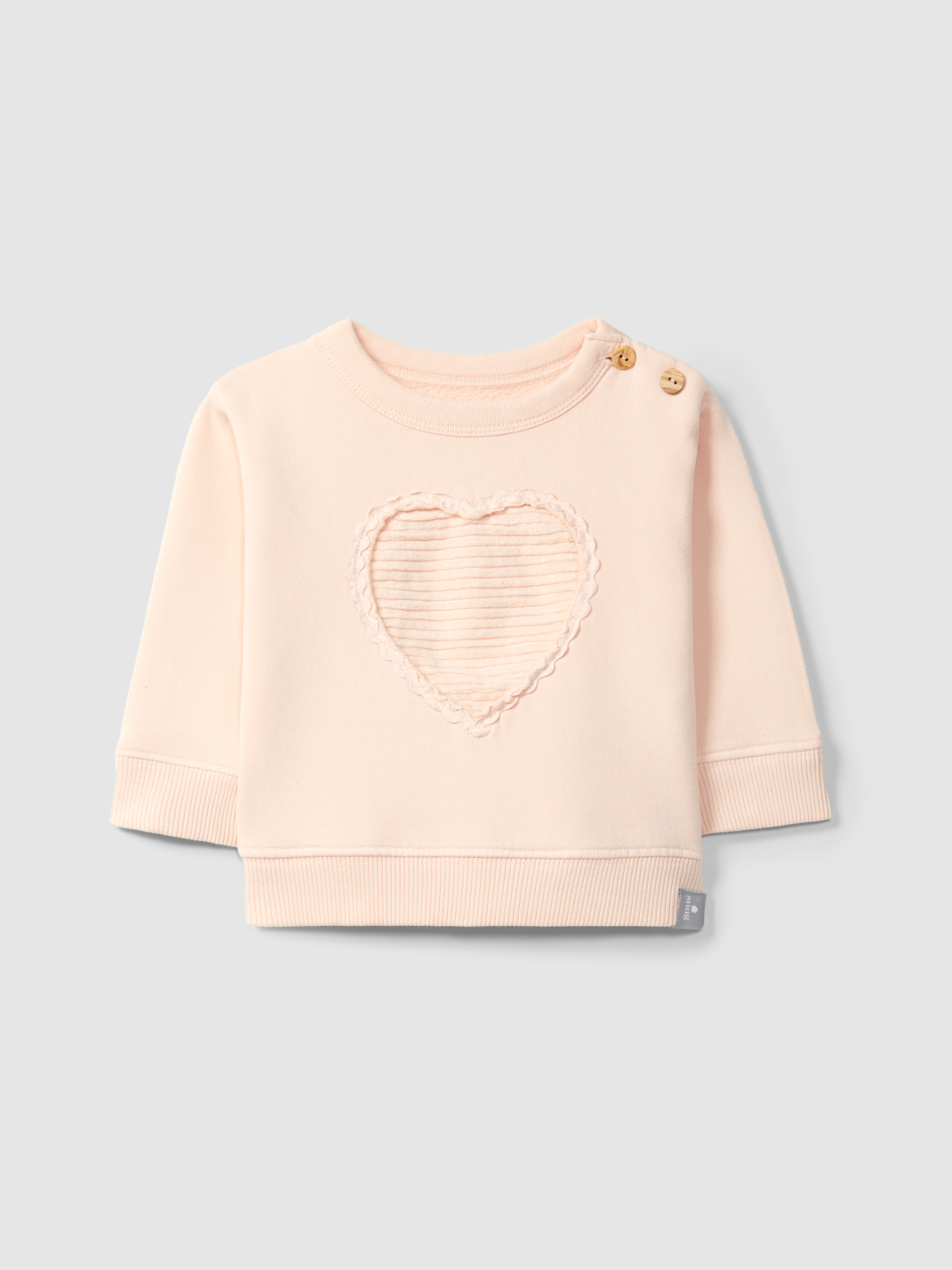 Plush sweatshirt with heart appliqué