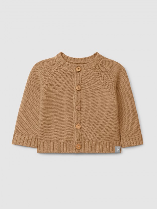 Knitted cardigan with a round neck