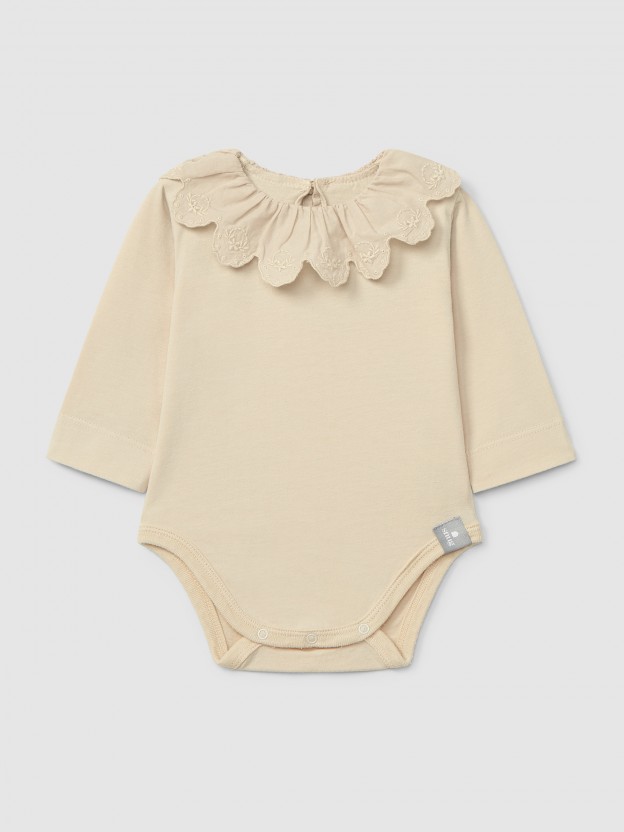 Organic cotton bodysuit with ruffled collar English embroidery
