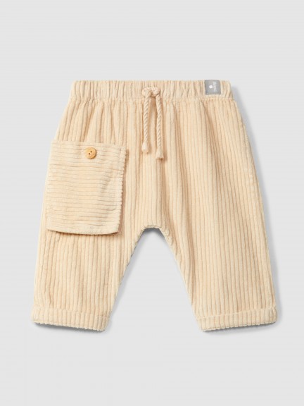 Pull-up pants in ribbed velvet with pocket