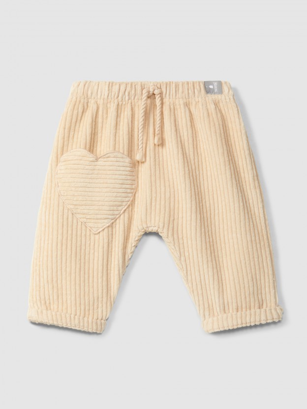 Pull-up pants in ribbed velvet with heart pocket Pull-up pants in ribbed velvet with heart pocket