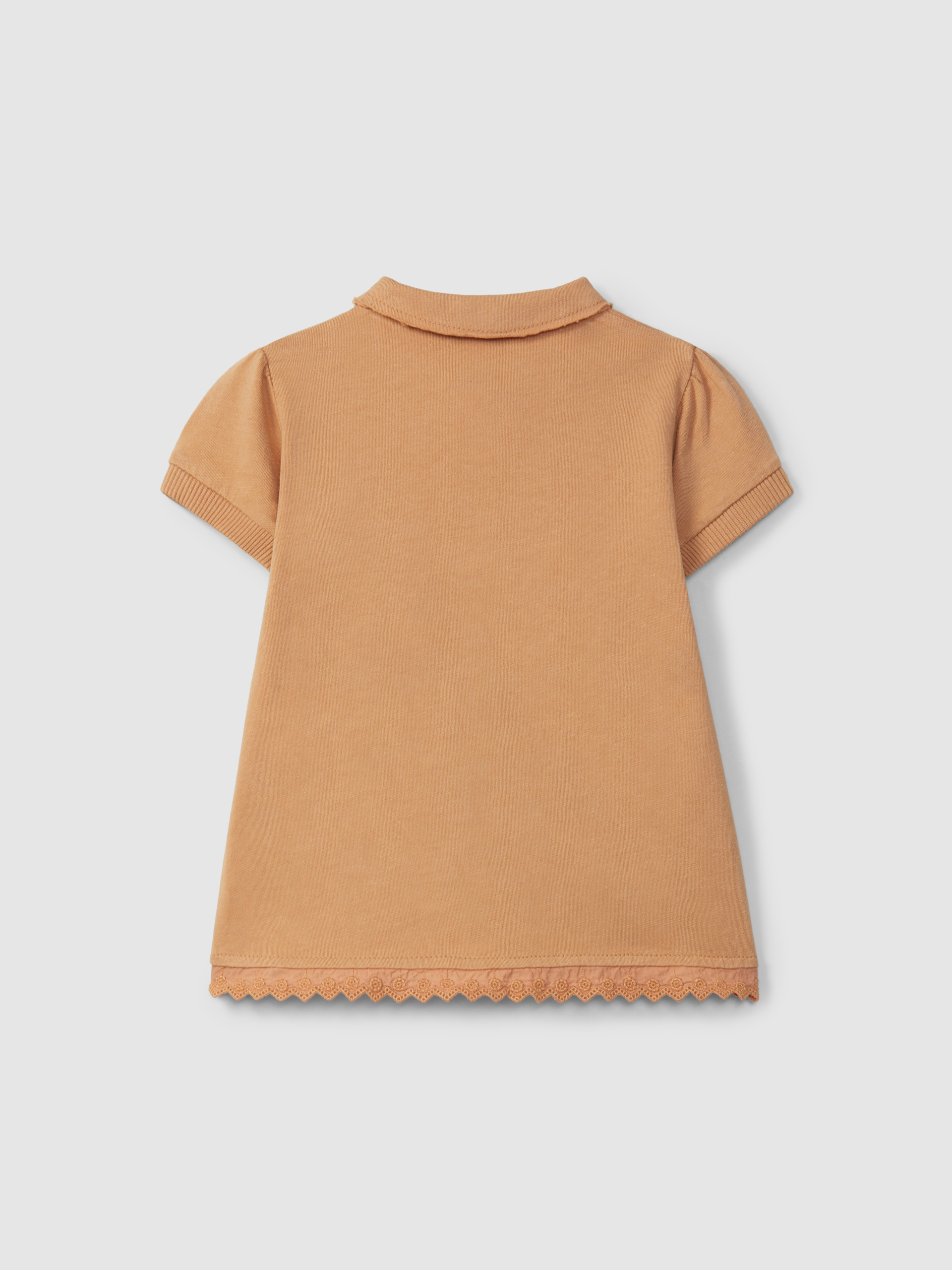 Plain jersey dress with embroidered details