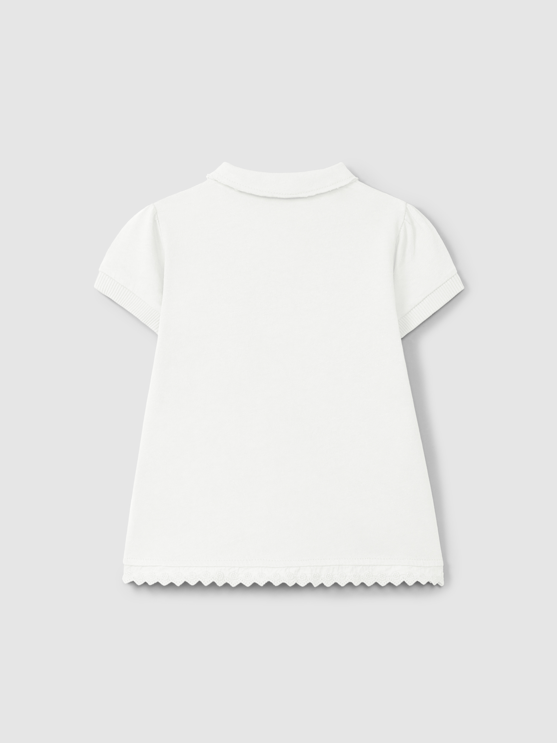 Plain jersey dress with embroidered details