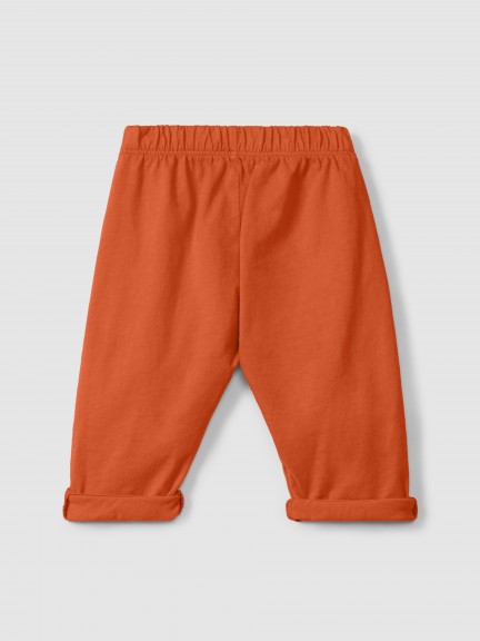 Plain jersey pull-up pants with embroidered details Plain jersey pull-up pants with embroidered details