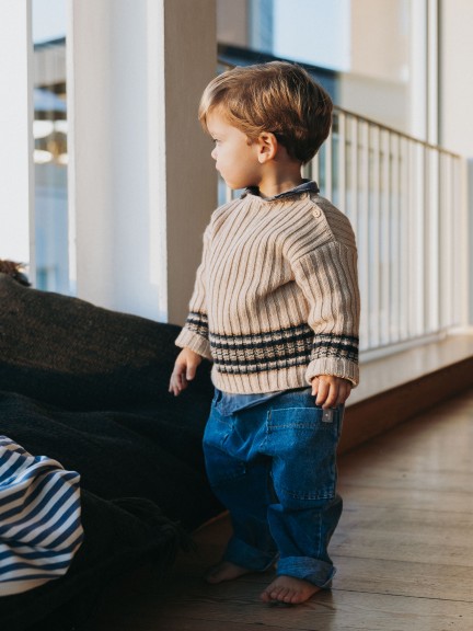 Knitted jumper with striped hem