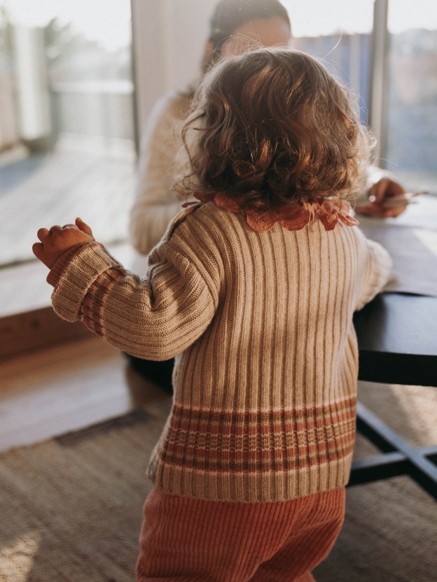 Knitted jumper with striped hem