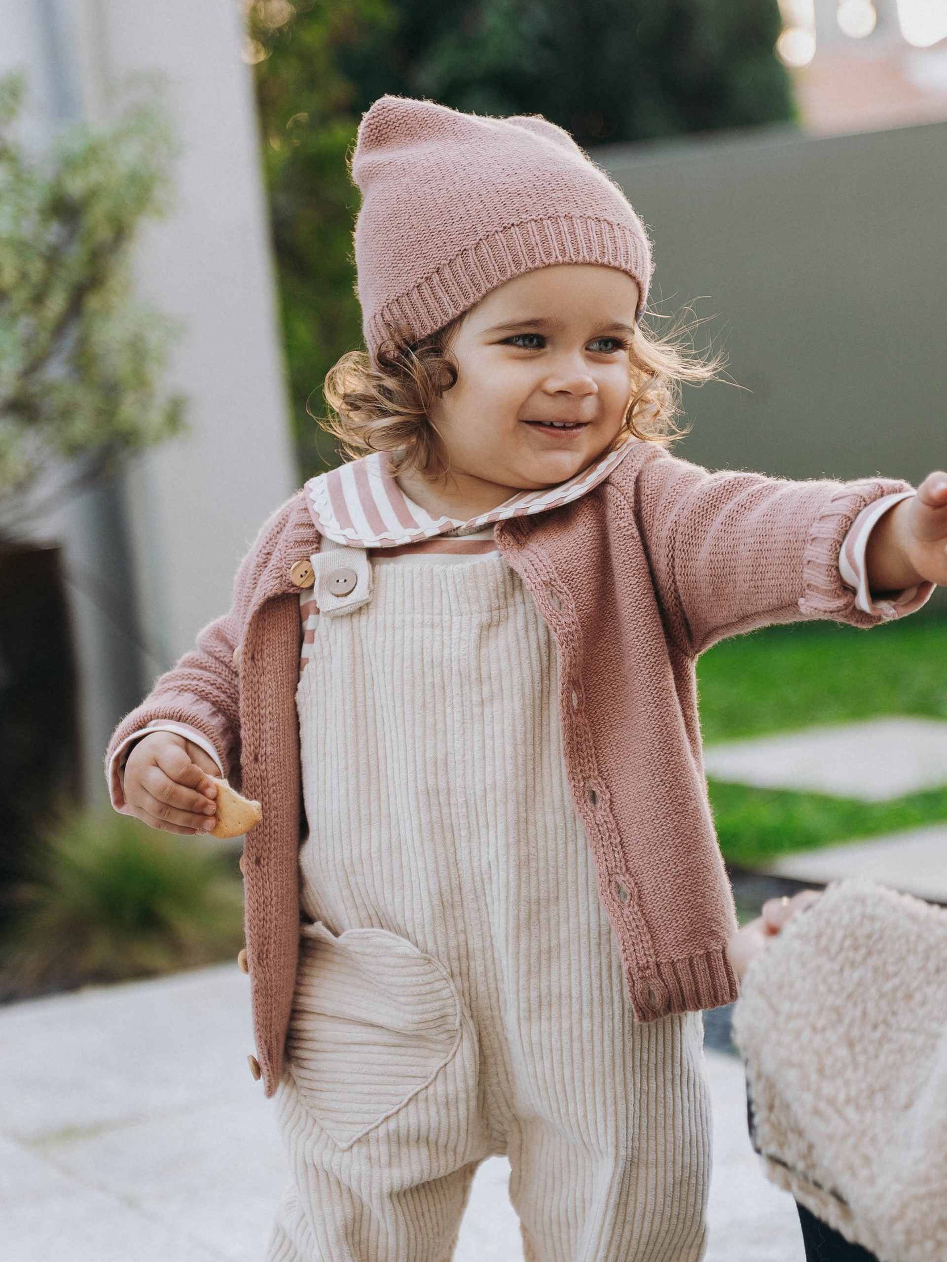 Knitted beanie with pom-pom