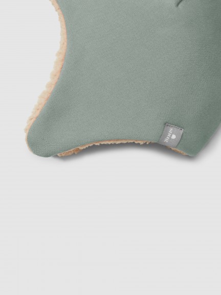 Beanie in plush with pom-pom and fur interior Beanie in plush with pom-pom and fur interior