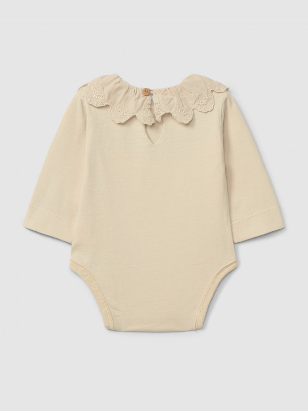 Organic cotton bodysuit with ruffled collar English embroidery
