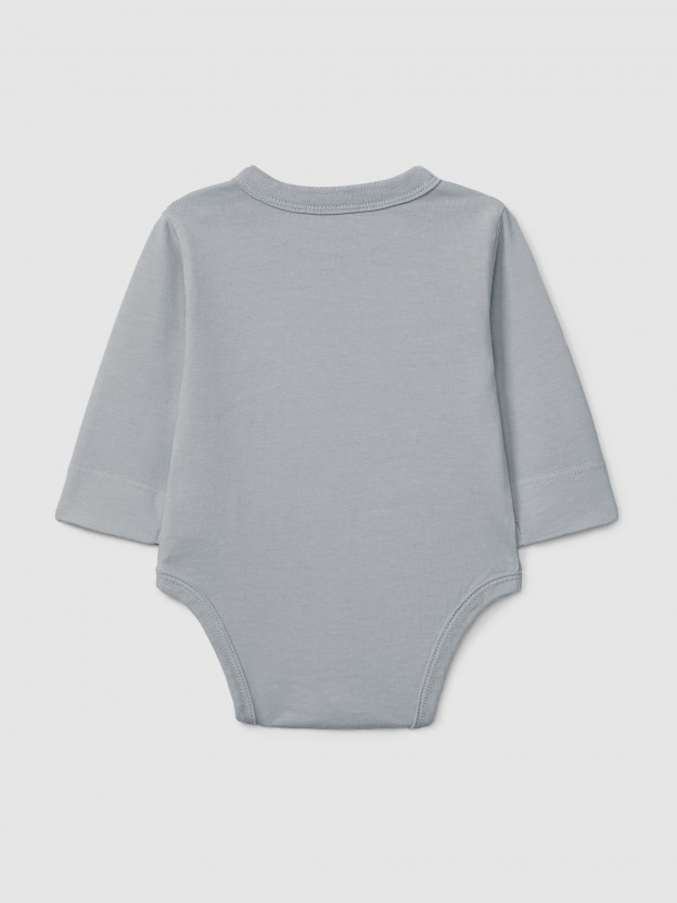 Organic cotton collarless bodysuit with pocket Organic cotton collarless bodysuit with pocket